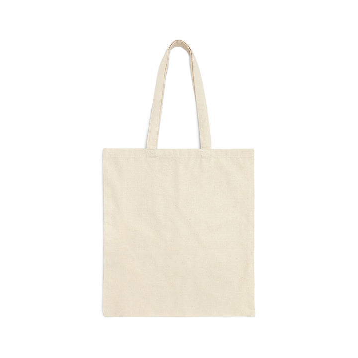Back of a tan canvas tote bag. There is no design on the back of the bag.
