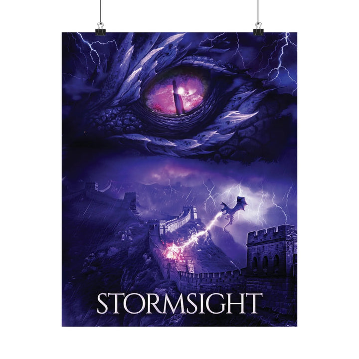 A poster featuring the artwork from the cover of Stormsight. Artwork features a purple dragon eye at the top. Below the eye, a dragon breathes lightning onto a wall. The title is at the bottom of the notebook cover.