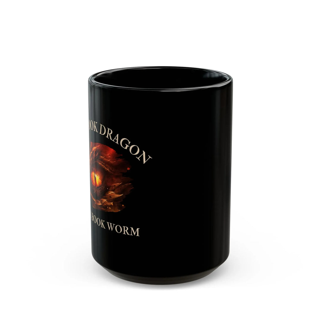 A black mug. Design on the mug reads "I'm a book dragon not a book worm." Between the text is the red dragon eye from the cover of Firesight.