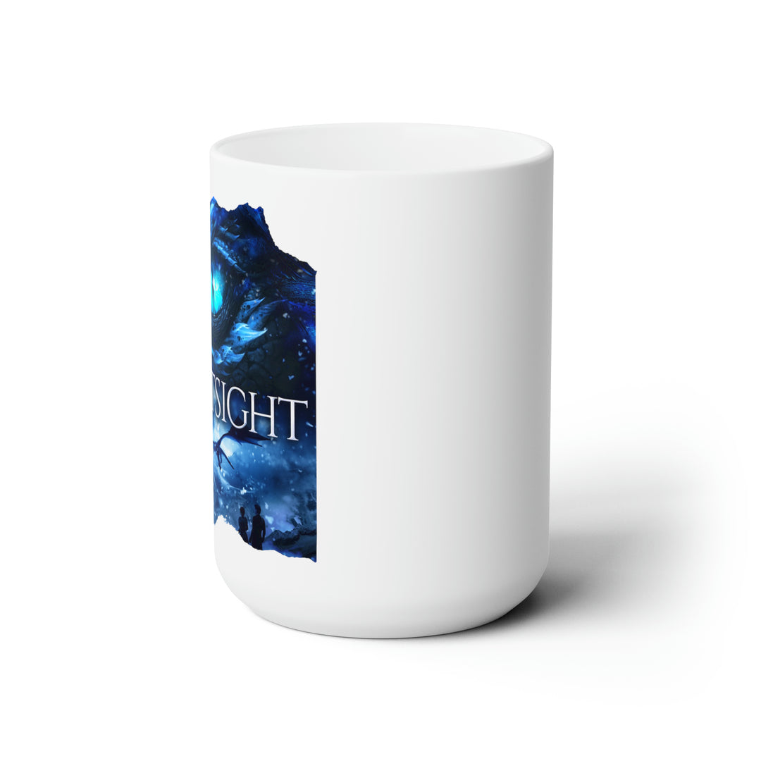 Side view of a white mug. Design on the mug is the cover of Frostsight, just showing the blue dragon eye and the title with the two main characters watching the dragon in the snowy mountain landscape.