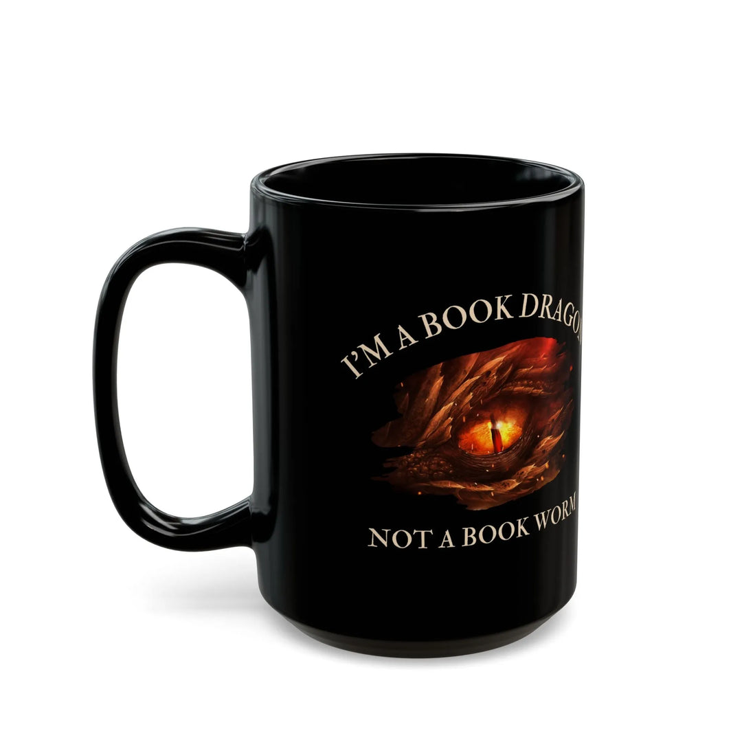 A black mug. Design on the mug reads "I'm a book dragon not a book worm." Between the text is the red dragon eye from the cover of Firesight.