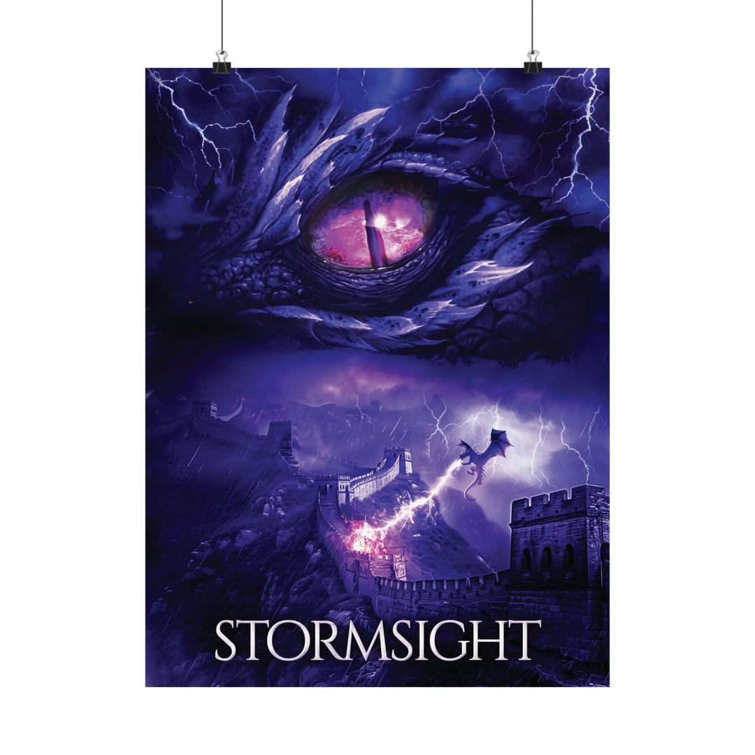 A poster featuring the artwork from the cover of Stormsight. Artwork features a purple dragon eye at the top. Below the eye, a dragon breathes lightning onto a wall. The title is at the bottom of the notebook cover.