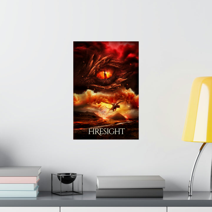 A poster hanging on a wall featuring the artwork from the cover of Firesight. Artwork features a red dragon eye at the top. Below the eye, the two main characters ride on a dragon over a volcano erupting. The title is at the bottom of the poster.