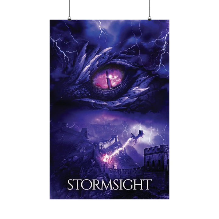A poster featuring the artwork from the cover of Stormsight. Artwork features a purple dragon eye at the top. Below the eye, a dragon breathes lightning onto a wall. The title is at the bottom of the notebook cover.