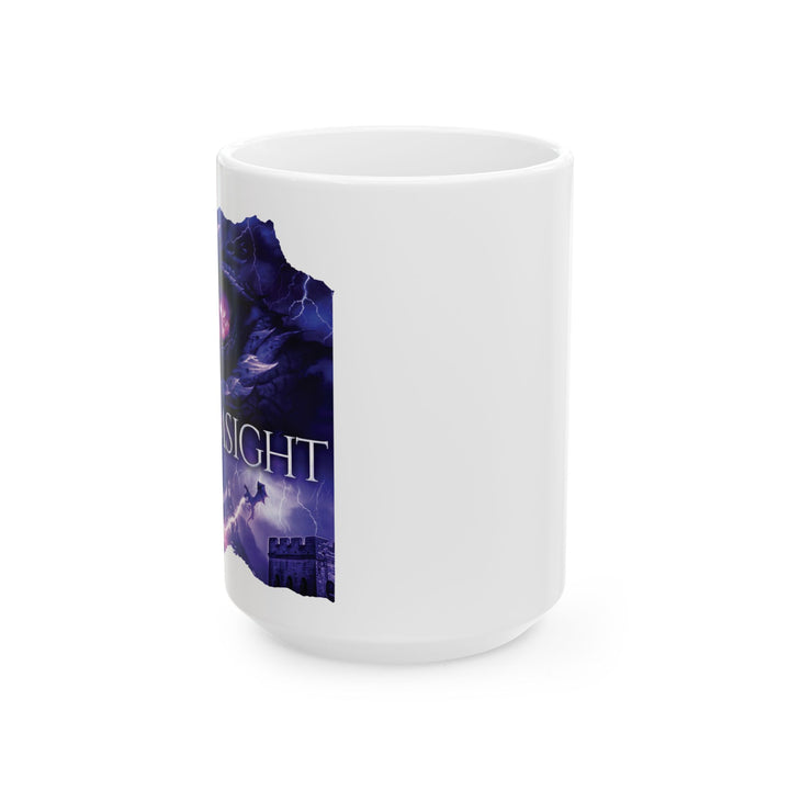 A white mug on a table. Design on the mug is the cover of Stormsight, just showing the purple dragon eye and the title with the a dragon breathing lightning onto a wall.