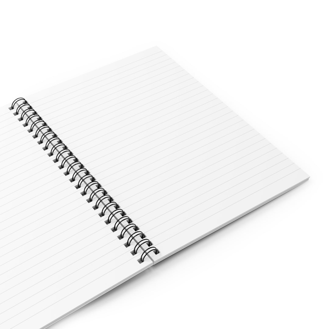 A blank opened notebook with lined pages.