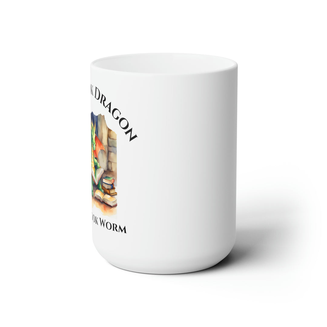 Side view of a white mug. Design on the mug reads "I'm a book dragon not a book worm." Between the text is a watercolor design of a dragon reading next to a stack of books.