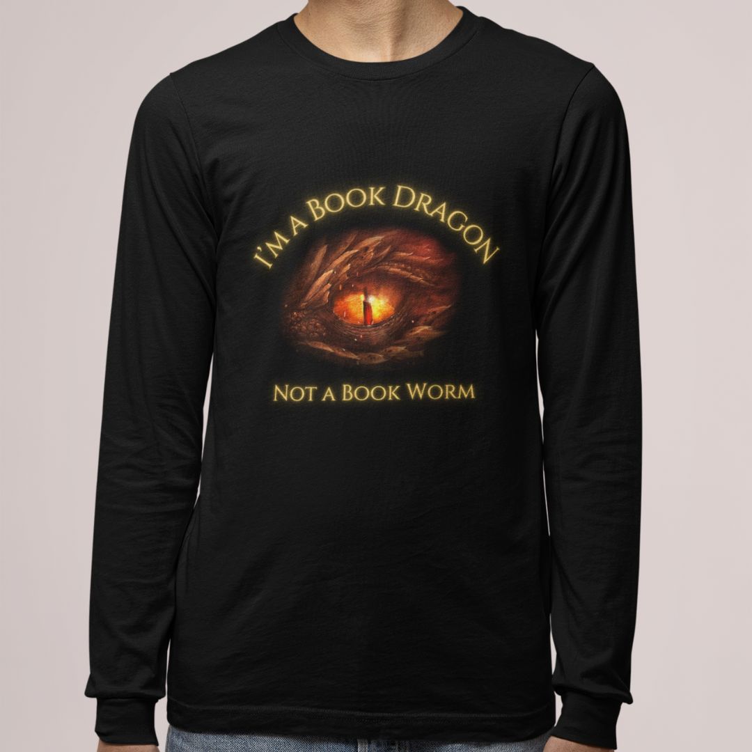 A man wearing a long sleeve black t-shirt. Design on the shirt reads "I'm a book dragon not a book worm." Between the text is the red dragon eye from the cover of Firesight.