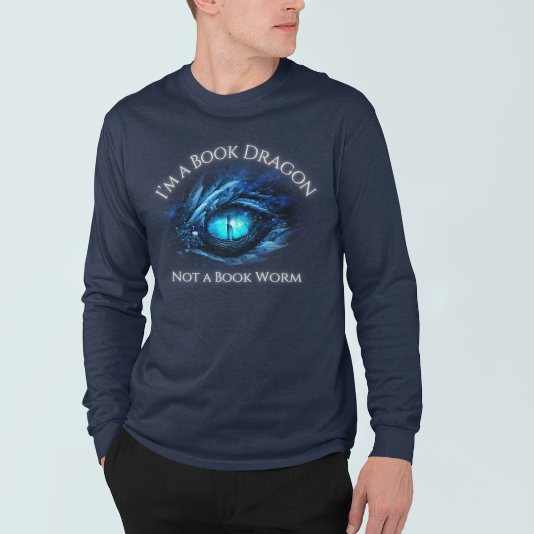 A man wearing a long sleeve navy t-shirt. Design on the shirt reads "I'm a book dragon not a book worm." Between the text is the blue dragon eye from the cover of Frostsight.