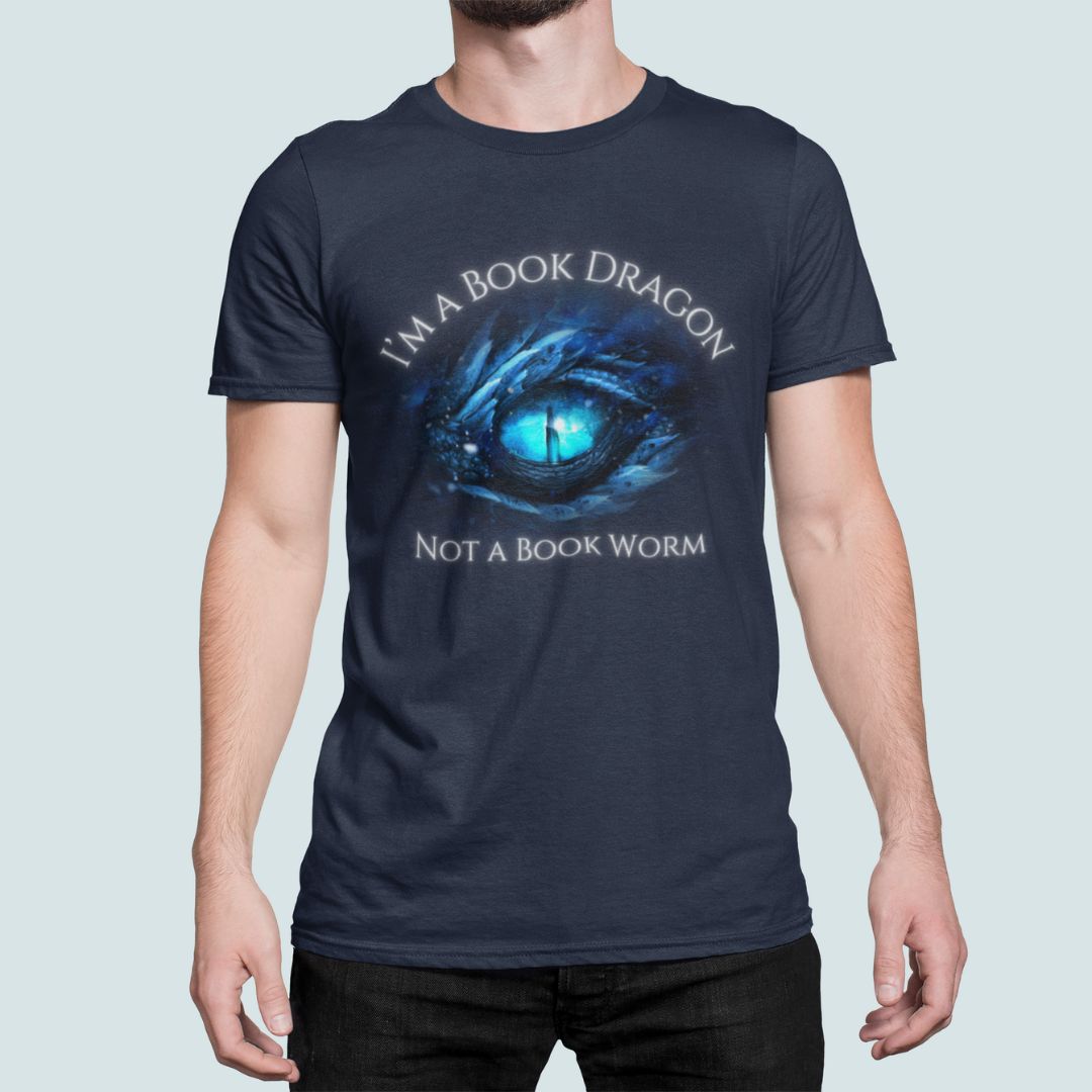 A man wearing a short sleeve navy t-shirt. Design on the shirt reads "I'm a book dragon not a book worm." Between the text is the blue dragon eye from the cover of Frostsight.