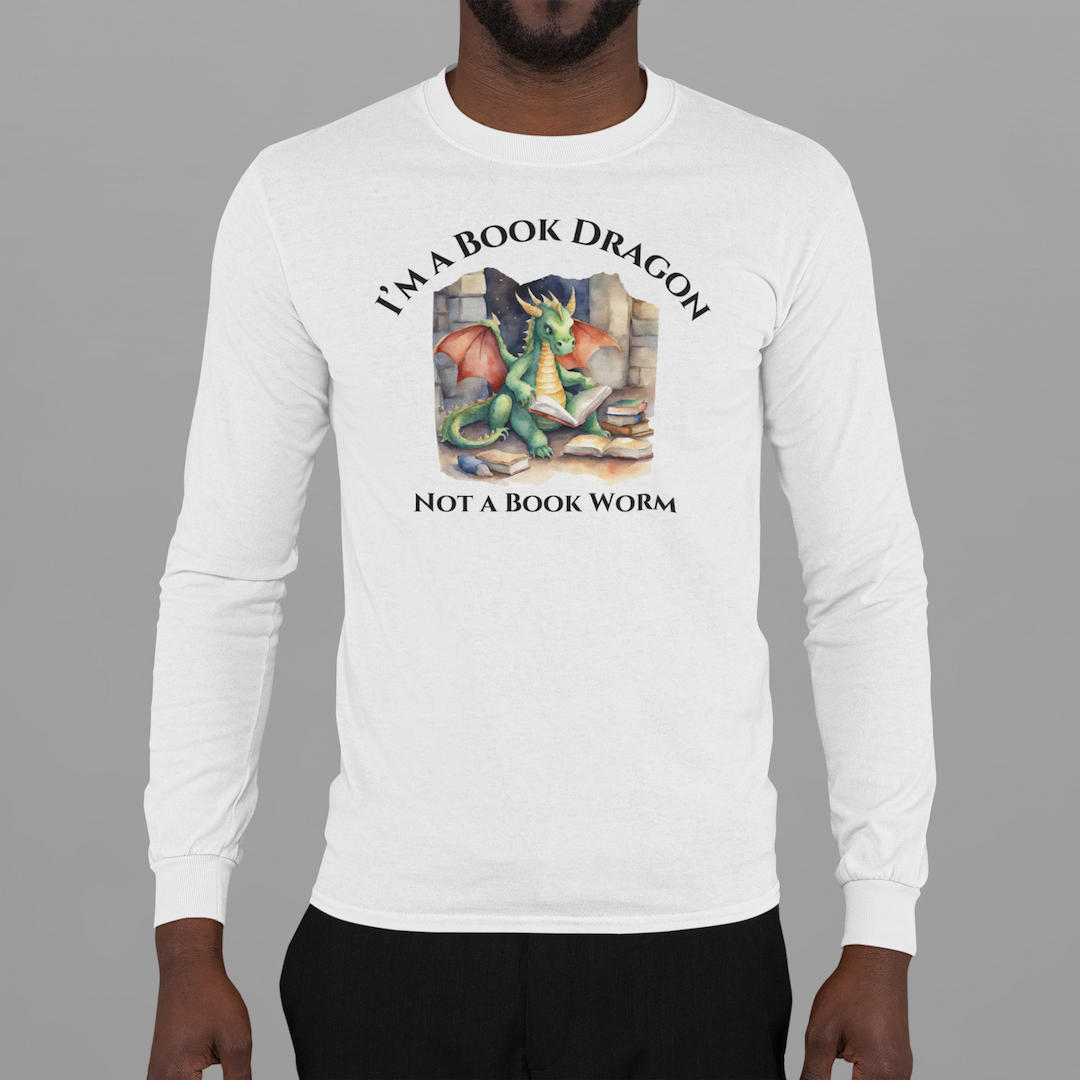 A man wearing a long sleeve heather gray t-shirt. Design on the shirt reads "I'm a book dragon not a book worm." Between the text is a watercolor design of a dragon reading next to a stack of books.