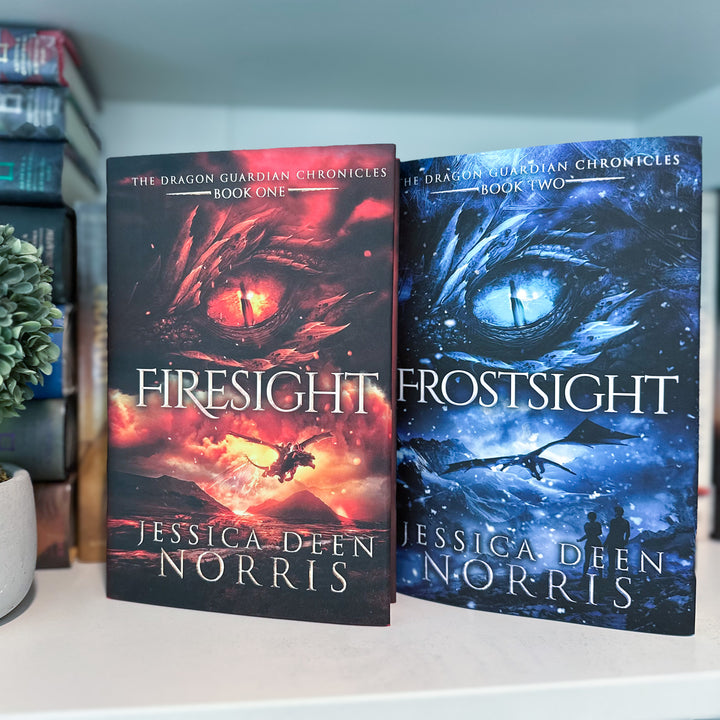 Firesight & Frostsight hardcovers shown on a bookshelf