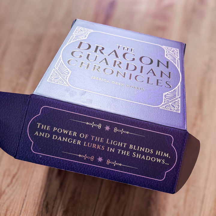 Front of the box says 'The power of the Light blinds him, and danger lurks in the Shadows..."