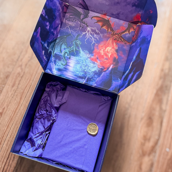 Open box with purple interior and dragon-themed design on the lid.