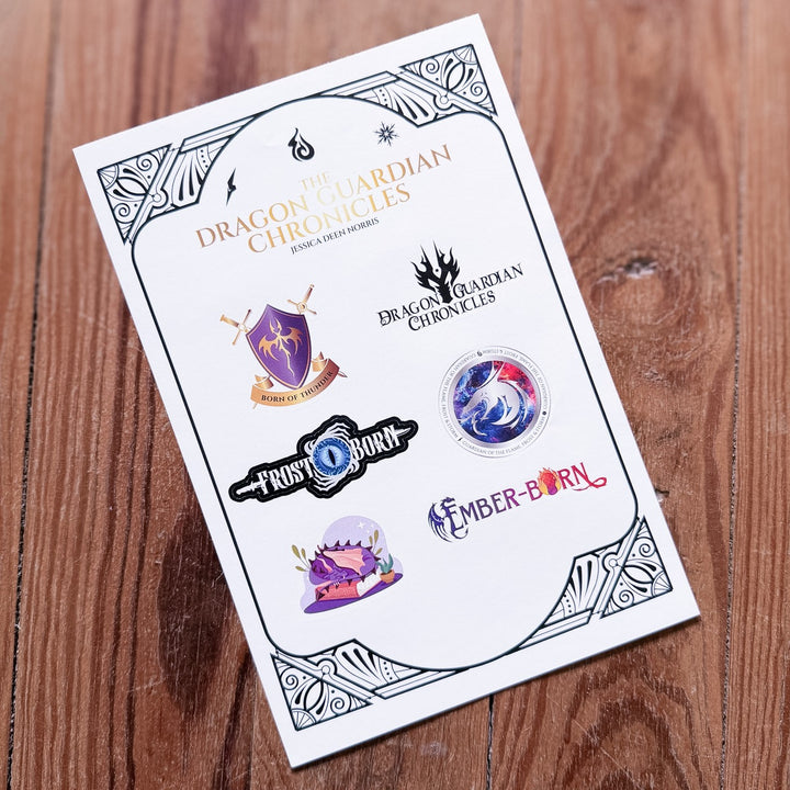 Sticker sheet from 'The Dragon Chronicles' on a wooden surface