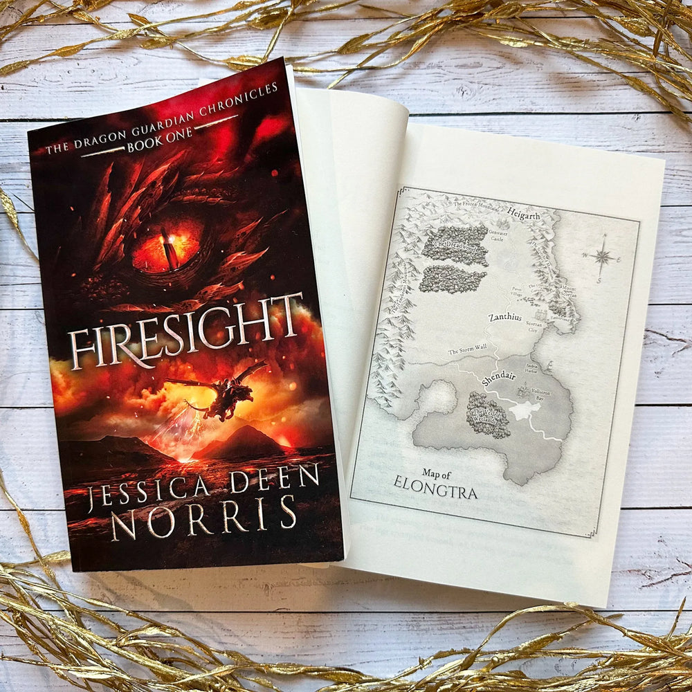 Firesight book cover and another copy open to the map of Elongtra#autograph-option_unsigned