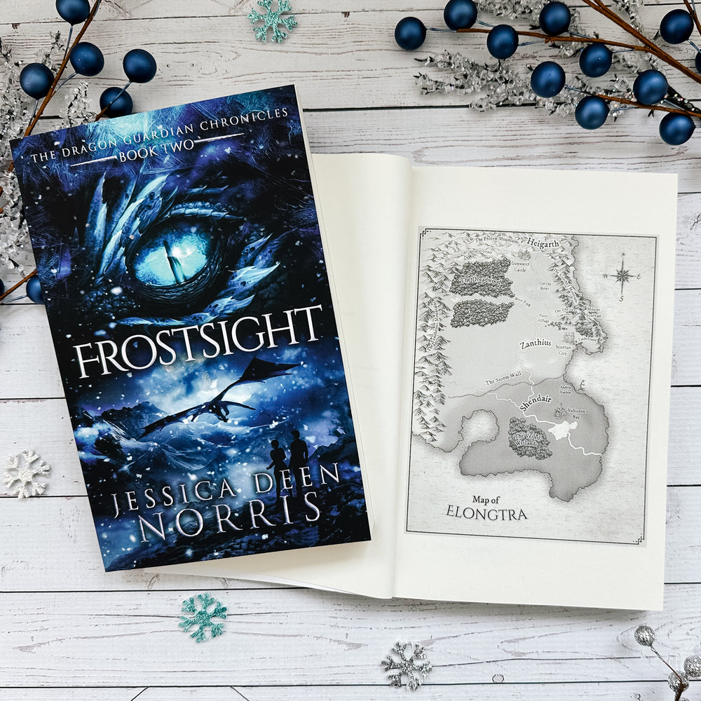 Frostsight book cover and another copy open to the map of Elongtra#autograph-option_unsigned