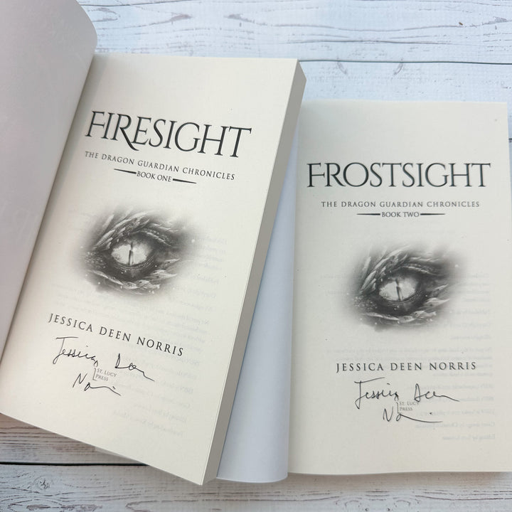 Firesight & Frostsight paperbacks open to title page showing Jessica Deen Norris's signature on both