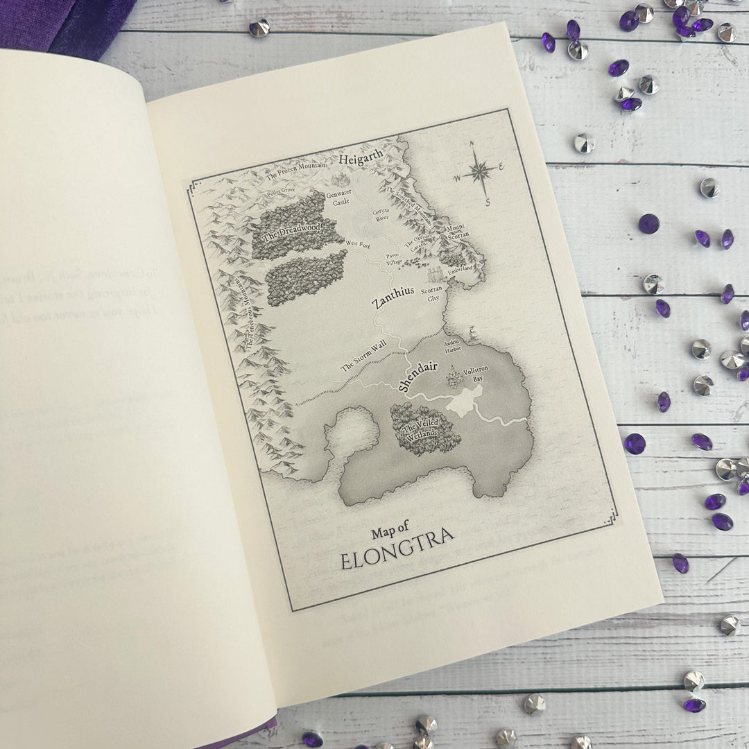 Stormsight open to the map of Elongtra#autograph-option_signed-by-author