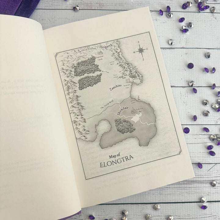 Stormsight open to the map of Elongtra#autograph-option_signed-by-author
