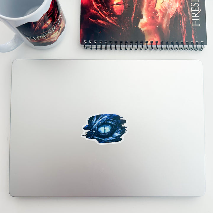 Frostsight dragon eye sticker on a laptop